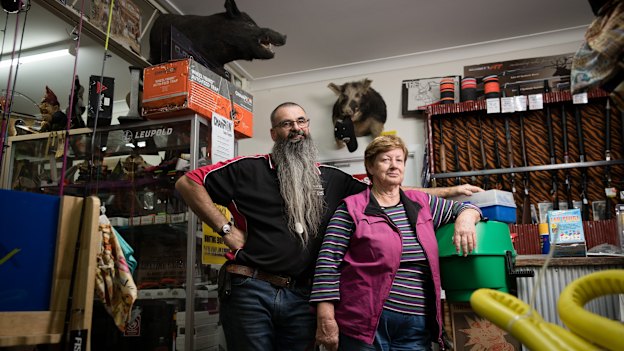 "Everyone feels pretty empty and we feel it in the shop":  Dave Thwaites and Merilyn Bradley in the newsagent and gun shop in Walgett.