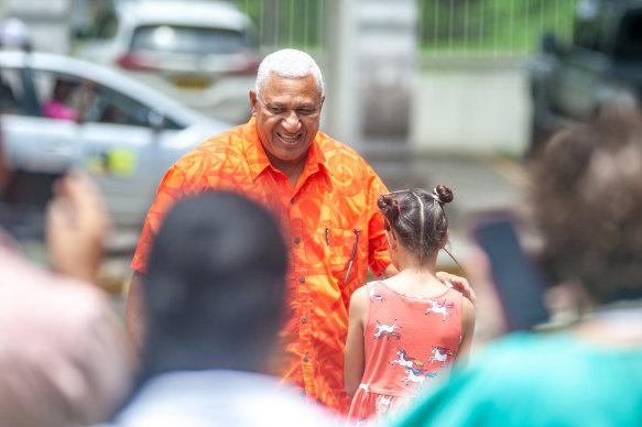 Prime Minister and FijiFirst Party leader Frank Bainimarama on his way to cast his vote during the election. His 16 years in power have come to an end. 