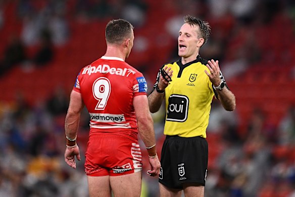 Damien Cook discusses the Bunker call with referee Jarrod Cole.