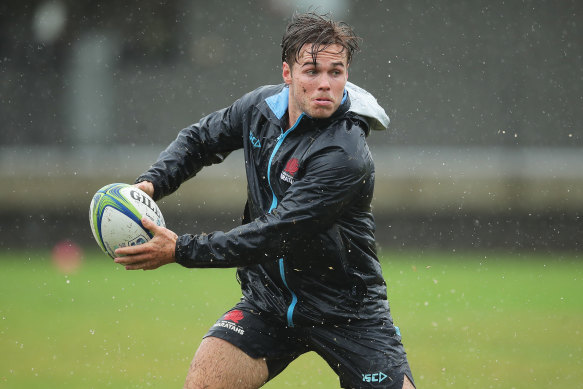 Will Harrison runs with the ball during a NSW Waratahs training session.