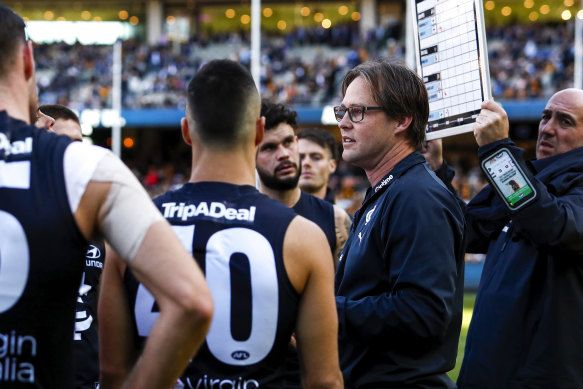 Carlton football department chief Brad Lloyd insists that Blues coach David Teague, pictured, is safe. 