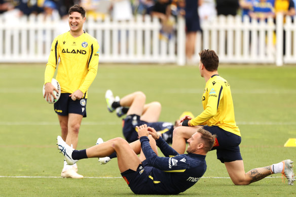 Parramatta halfback Mitchell Moses shares a laugh with co-captain Clint Gutherson during the Eels training session.