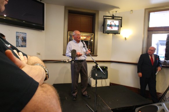 Alan Jones listens to Roger Rogerson at the launch of Rogerson’s book at the Iron Duke in 2009.