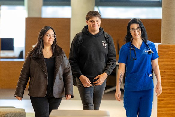 Victoria University students  Athraa Yousif (left), Denzel James and Brooke Theodoridis have studied under the university’s block model, which allows students to do a single subject at a time.
