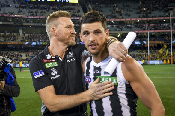 Former Pies coach Nathan Buckley with Pendlebury in 2018.