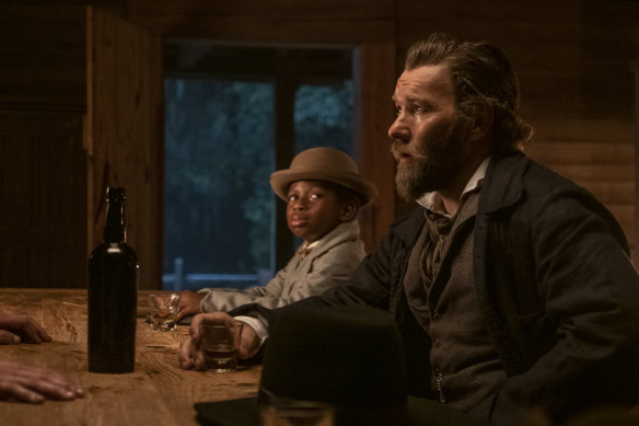 Chase Dillon as Homer and Joel Edgerton as Ridgeway in The Underground Railroad.