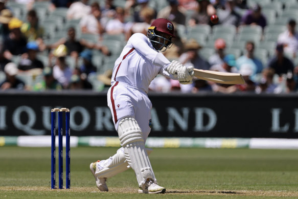 West Indies No.11 Shamar Joseph hits a six.