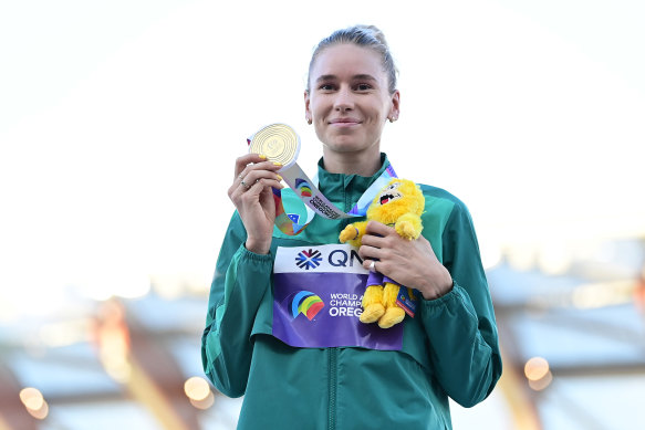 Eleanor Patterson with the prize after her high jump victory at the world championships.