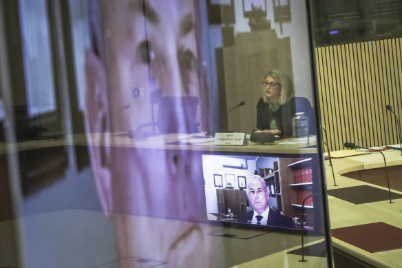 Senator Katy Gallagher and Aged Care Minister Richard Colbeck during a Senate select committee hearing on COVID-19.