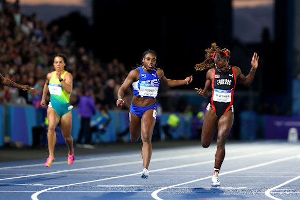 Adaejah Hodge (centre) crossed the finish line ahead of Australia’s Torrie Lewis (left).