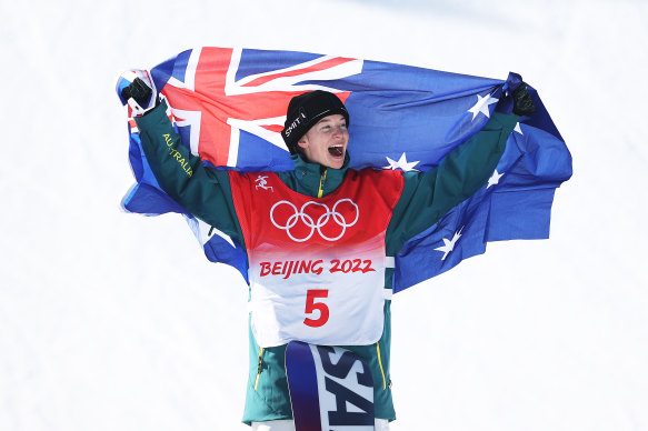 Tess Coady celebrates after winning bronze in the Women’s Snowboard Slopestyle.