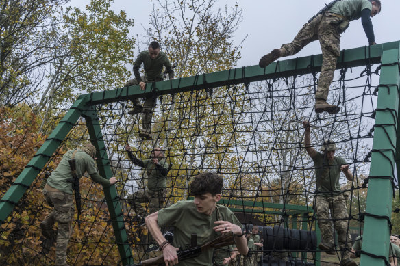 New recruits with the Ukrainian Army’s Third Separate Assault Brigade take part in training in Kyiv in October.