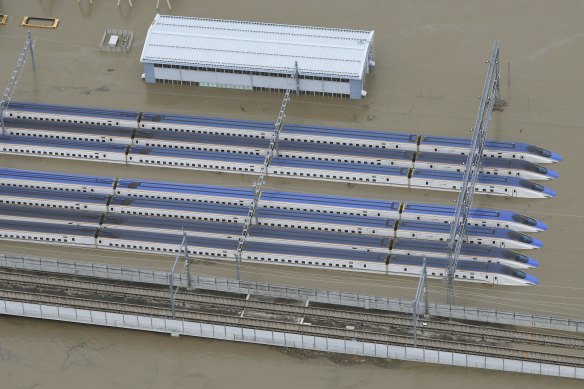 Bullet trains submerged at their base in Akanuma, Nagano Prefecture, central Japan.