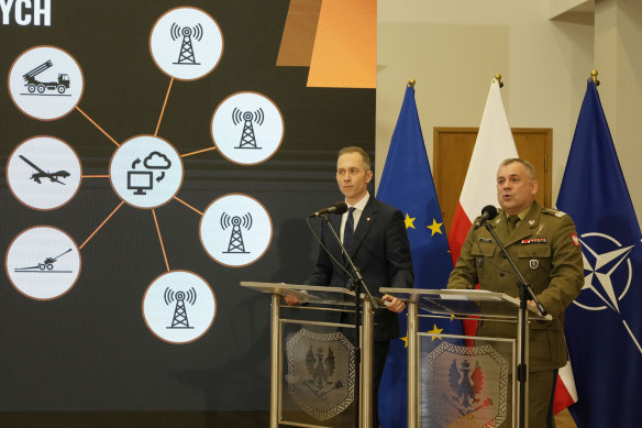 Polish armed forces’ Chief of Staff General Wieslaw Kukula, right, and Deputy Defence Minister Cezary Tomczyk, left, speak about a program of strengthening the defence of NATO’S eastern flank.