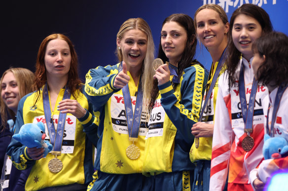 Mollie O’Callaghan, Shayna Jack, Meg Harris and Emma McKeon after their women’s 4x100m freestyle victory. 