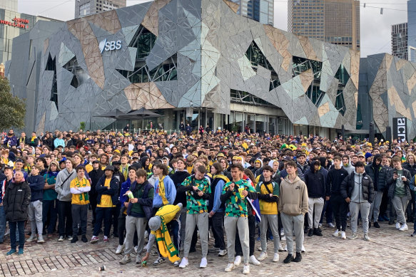 Socceroos fans at Fed Square watch Australia play France in their opening match of the 2022 World Cup in Qatar