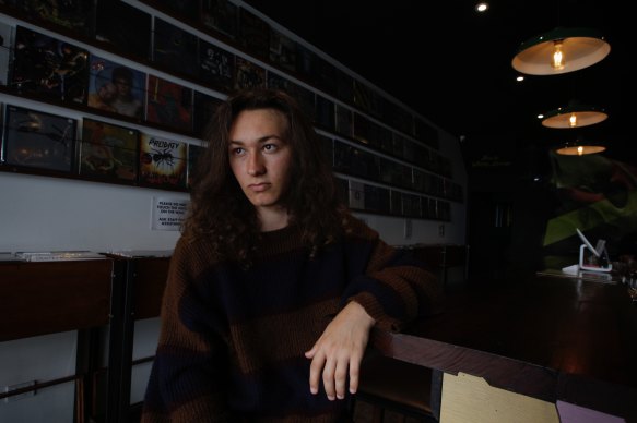 New laws allow 17-year-olds such as Avery Richards to enter Cottonmouth, a record store and small bar in Enmore. 