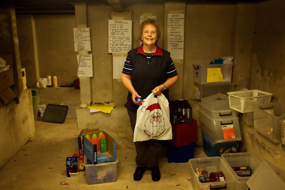 Sister Harris in 2008 with some of the Christmas hampers that were distributed to boarding house and nursing home residents.