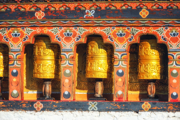 Prayer wheels are found everywhere and spun clockwise for good fortune.