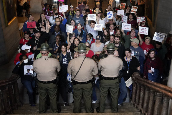 Tennessee State Troopers block the stairwell leading to the legislative chambers in Nashville.