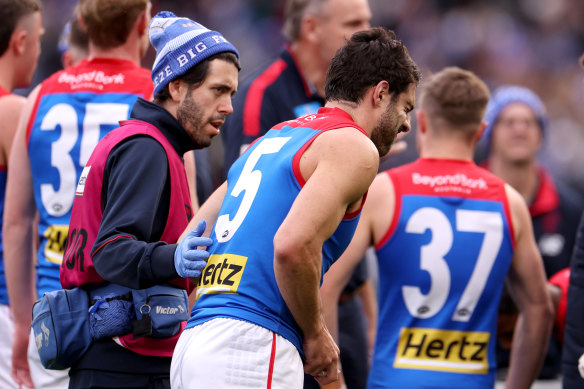 Petracca struggling in pain at quarter-time on Monday.