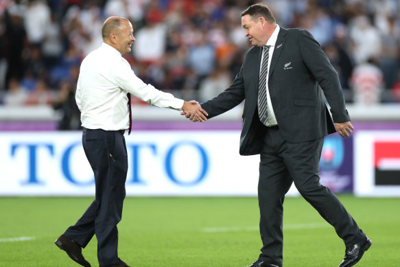 Eddie Jones (left) and Steve Hansen (right) shake hands before the 2019 Rugby World Cup semi-final between England and New Zealand.