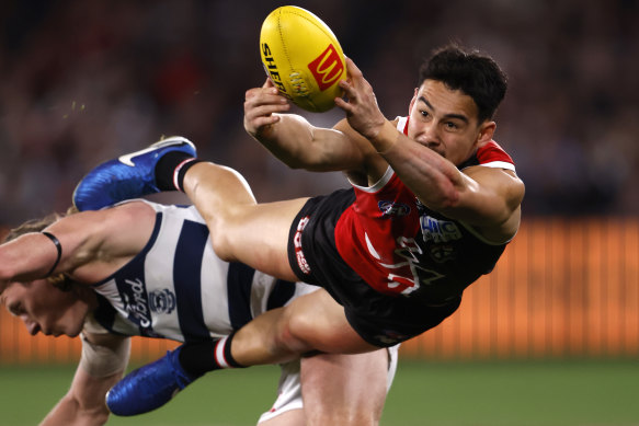 Mitch Owens of the Saints attempts to mark the ball.