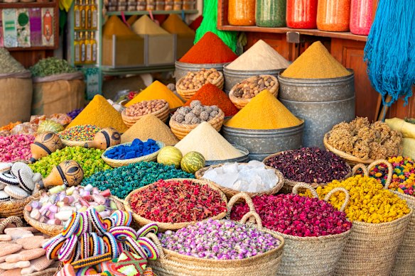 Spices and dyes for sale in a Marrakesh souk.