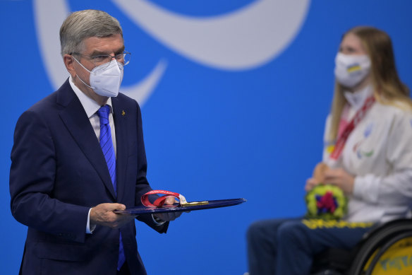 Thomas Bach at a swimming medal ceremony on Wednesday.