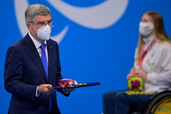 Thomas Bach at a swimming medal ceremony on Wednesday.