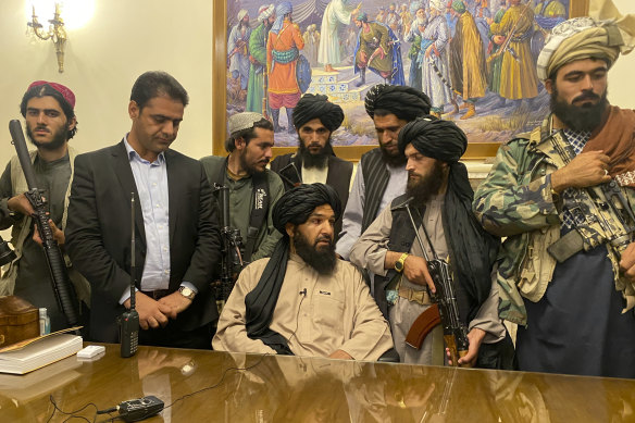 Taliban fighters take control of Afghan presidential palace in Kabul, Afghanistan.