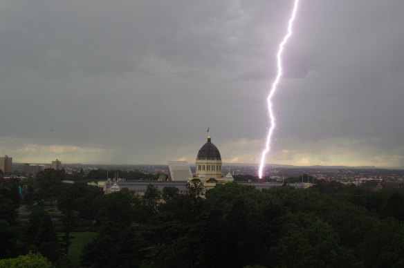 A reader catches the moment lightning strikes close to the Melbourne Exhibition Building on Wednesday afternoon.