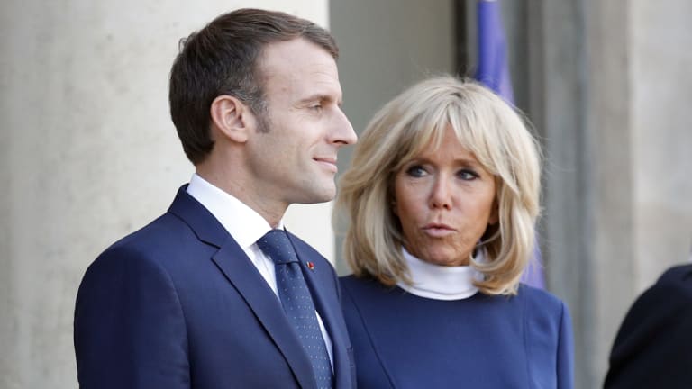 French president Emmanuel Macron, left, with his wife Brigitte Macron on Monday.