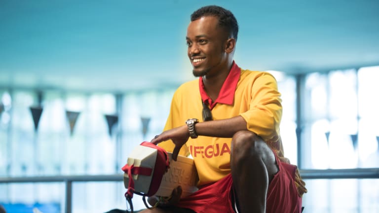 Abdullahi Mohamed grew up in Somalia not knowing how to swim but has since learnt and trained to become a lifeguard in Australia.