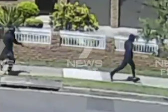 CCTV shows two men running through Rockdale after the fatal shooting.