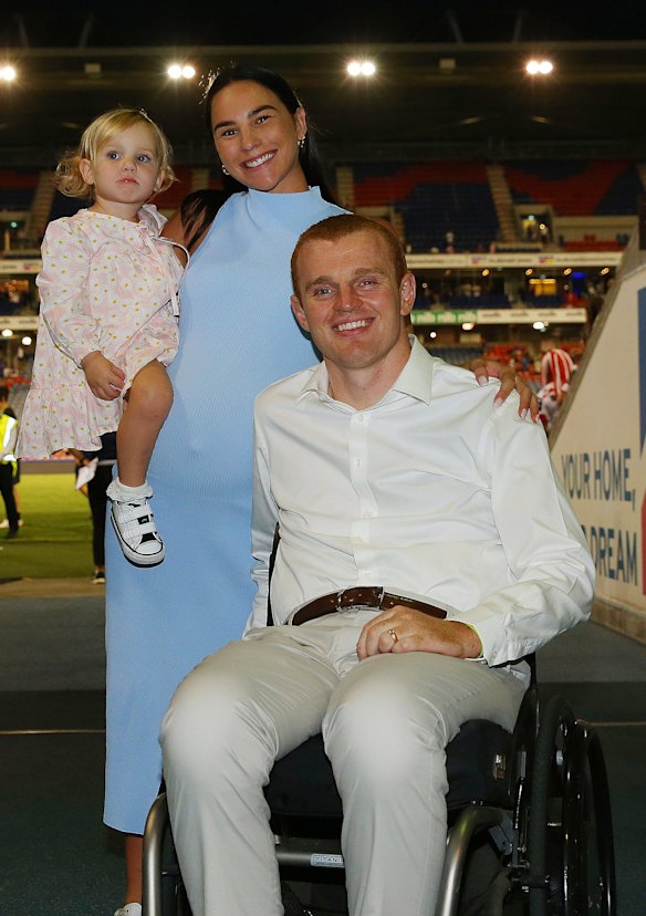 Alex McKinnon with wife Teigan.