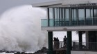 Large waves, like this one pictured at Currumbin Vikings Surf Club, have been hammering the Gold Coast in recent days.