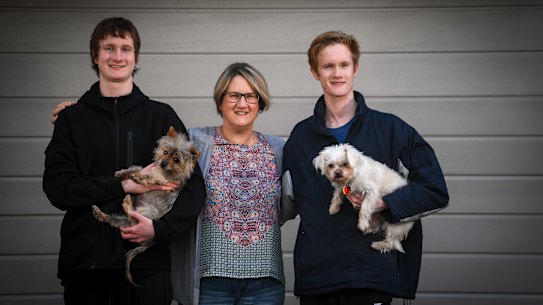 Bernie Bergin with her sons Patrick, in year 11 and Xavier, in year 9, are navigating their fifth stint of remote learning. 