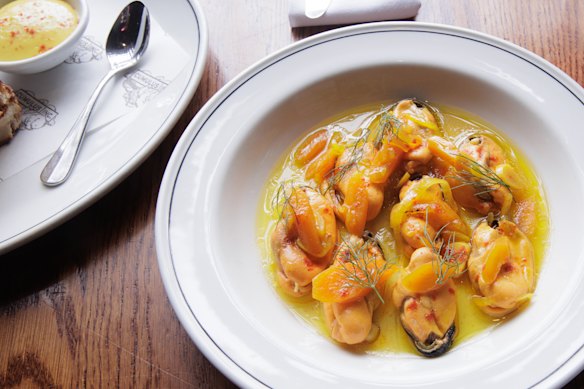 Mussels in an escabeche broth with saffron aioli (left).