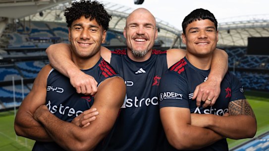 Keep it in the Chookpen: Angus Crichton (centre) says the Roosters back-row stocks are in good hands with Siua Wong (left) and Salesi Foketi (right).