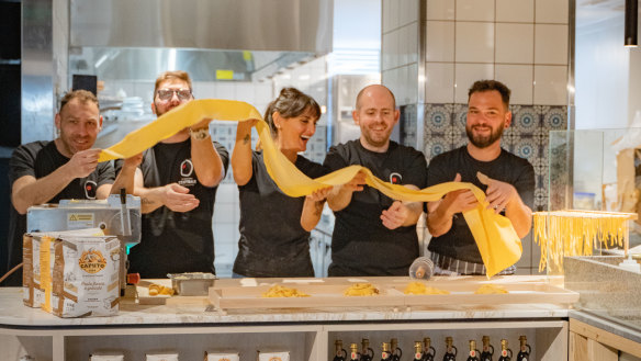 Pasta maker Annapaola D’Alessio, pictured (centre) with her team, is one of the 23 “artisan” stallholders.