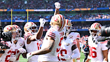 49ers celebrate scoring a touchdown.