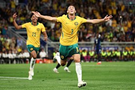 Alessandro Circati celebrates after scoring Australia’s first goal against Brazil in Suncorp Stadium.