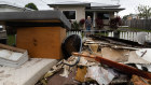 The flood recovery in Mullumbimby will have to go ahead without mobile service for now after a fire, which is suspected to have been deliberately lit, damaged Telstra’s tower in the region.