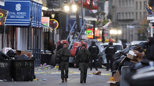 Emergency services attend the scene after a vehicle drove into a crowd on New Orleans’ Canal and Bourbon Street.