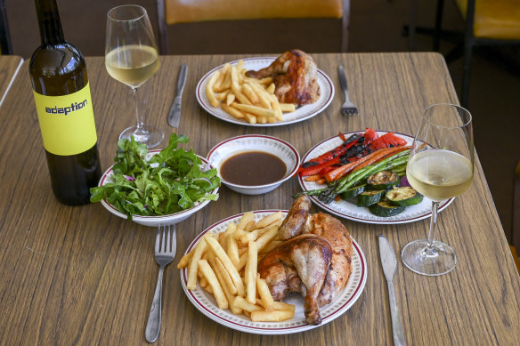 Rotisserie chicken cooked over charcoal is the focus at Le Coq Door in Harcourt.