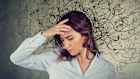 Thoughtful stressed young woman