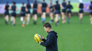 Brendon Bolton, pictured here at training on Tuesday, and the Carlton coaches were kicked out of the room after the initial review of the loss to GWS.
