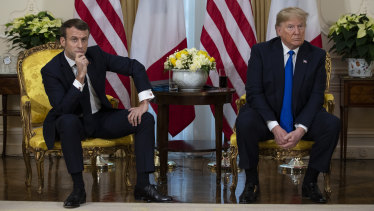 Donald Trump with French President Emmanuel Macron during their awkward press conference.