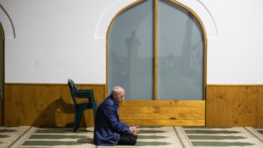 Saeed Maasarwe in prayer after the funeral by himself.